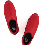 Red slip-on shoe with black & white sole top view