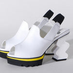 White heel with black & yellow sole pair
