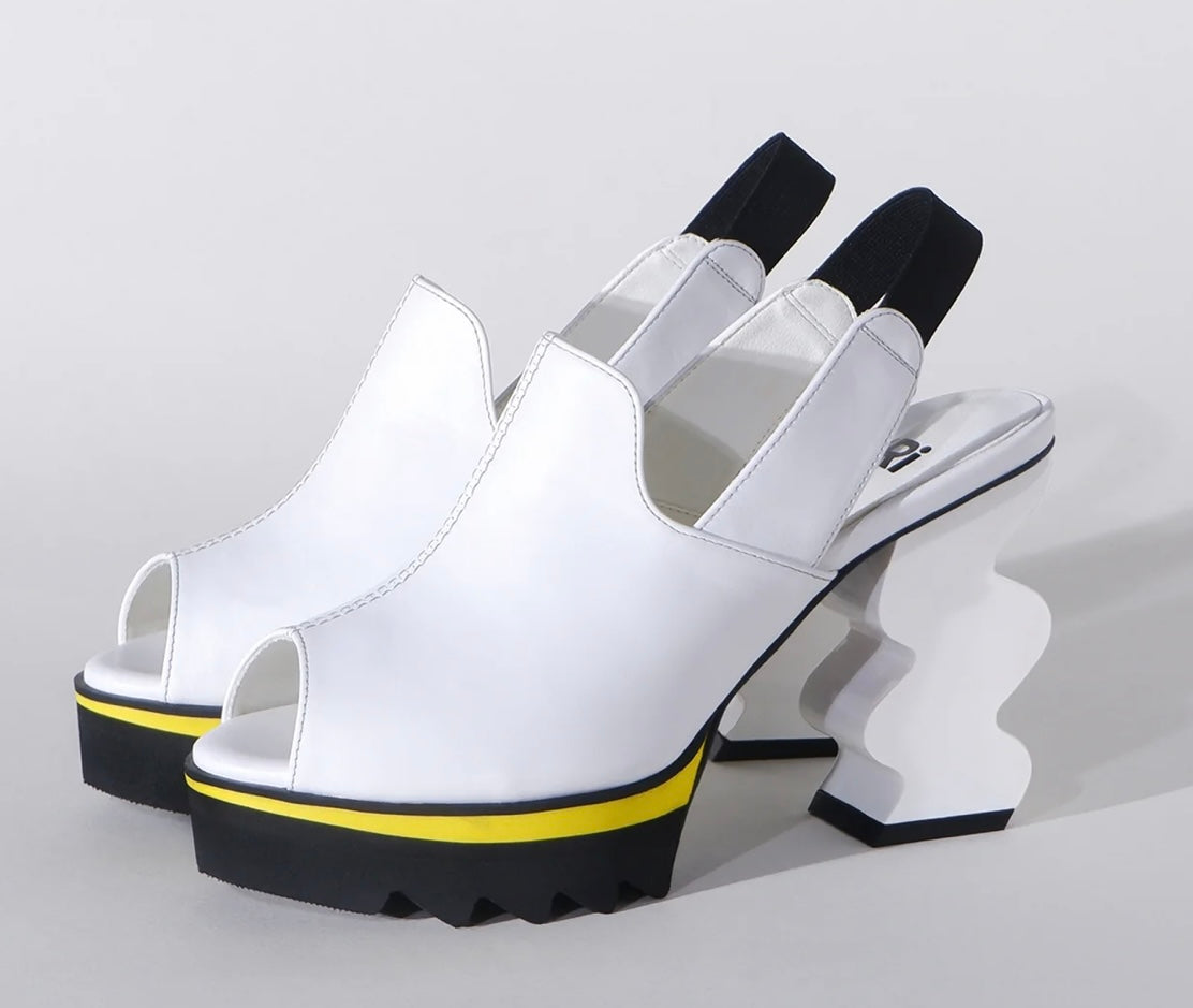White heel with black & yellow sole pair