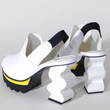 White heel with black & yellow sole heel view