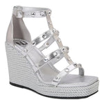 Silver wedge sandal with platform sole close-up