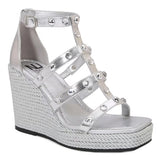 Silver wedge sandal with platform sole close-up