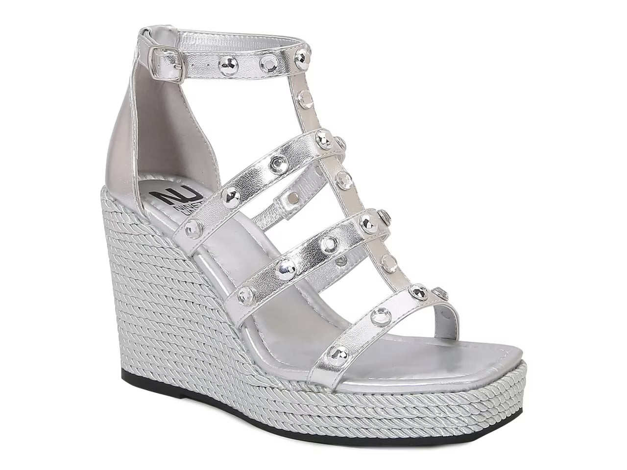 Silver wedge sandal with platform sole close-up