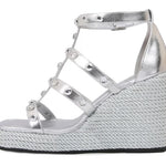 Silver wedge sandal with platform sole inner side view
