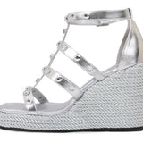 Silver wedge sandal with platform sole inner side view