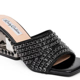 Black embellished high-heeled shoes side view