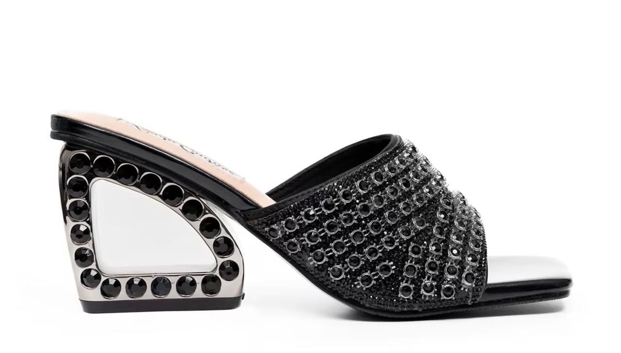 Black embellished high-heeled shoes close-up