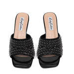 Black embellished high-heeled shoes pair