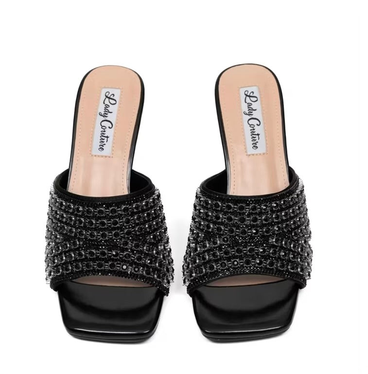 Black embellished high-heeled shoes pair