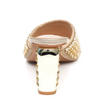 Gold embellished high-heeled shoe heel view