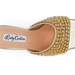 Gold embellished high-heeled shoe top view