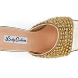 Gold embellished high-heeled shoe top view