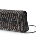 Black beaded patterned handbag with black chain strap side view