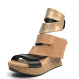 Tan wedge sandal with black accents