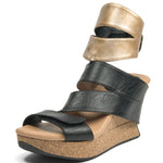 Wedge sandal with black straps and gold top