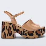 Leopard print platform heel with beige straps close-up