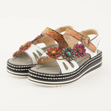 White sandal with colorful floral decorations and black & white sole pair