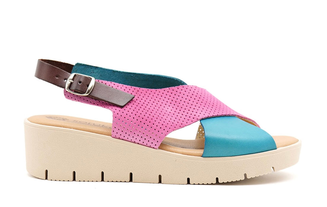Pink and blue wedge with a beige sole, brown heel strap and buckle closure close-up