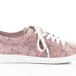 Pink & mauve floral patterned sneaker with white sole close-up