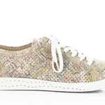 Green & mauve floral patterned sneaker with white sole close-up