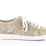 Green & mauve floral patterned sneaker with white sole close-up