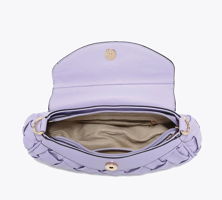 Lavender handbag with woven texture and gold accents top view