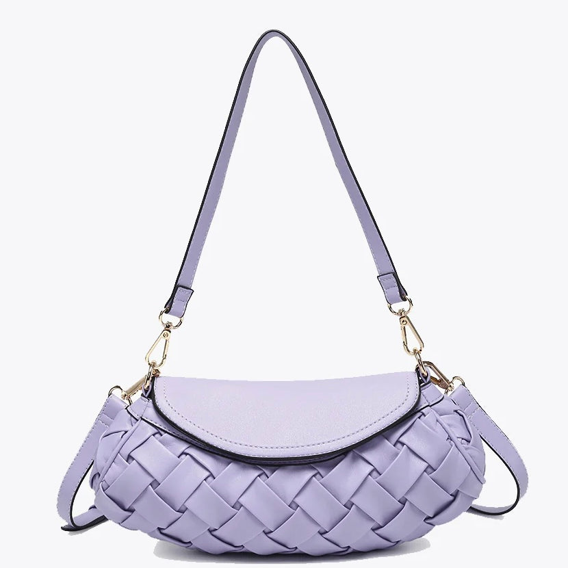 Lavender handbag with woven texture and gold accents close up
