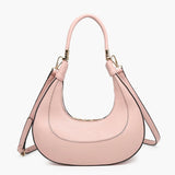 Pink handbag with a hand strap and shoulder strap close-up