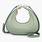 Light green handbag with a hand strap and shoulder strap back