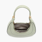 Light green handbag with a hand strap and shoulder strap opening