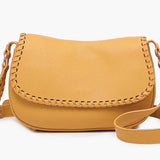 Yellow crossbody bag with woven detail close-up