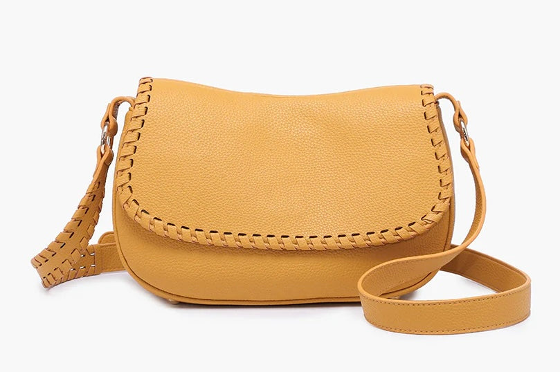 Yellow crossbody bag with woven detail close-up