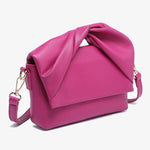 Pink handbag with a bow design alt view