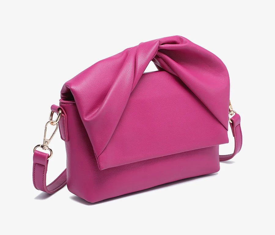 Pink handbag with a bow design alt view