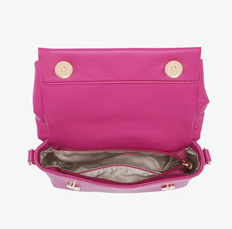 Pink handbag with a bow design opening