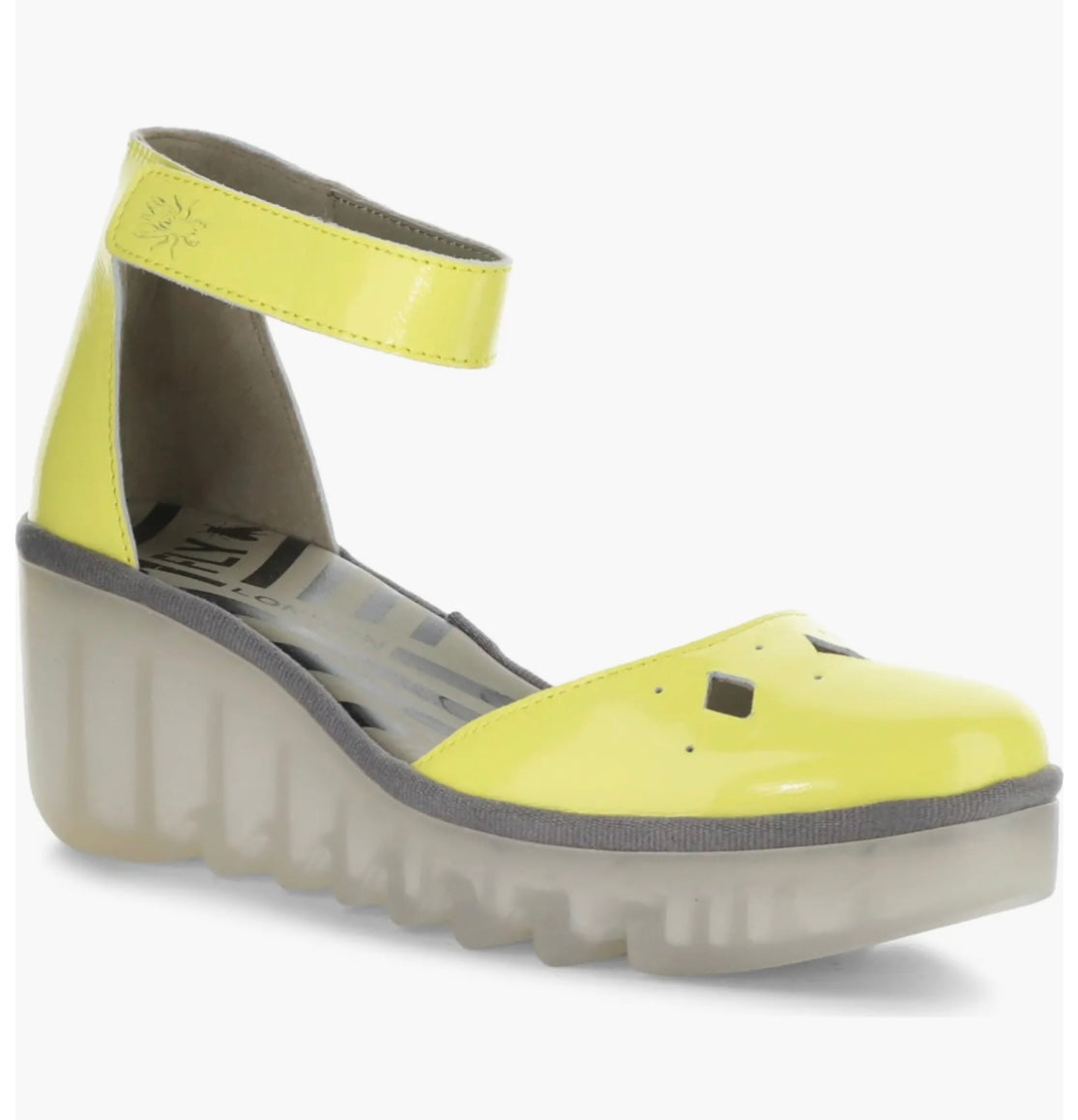 Yellow wedge with clear sole and velcro strap side view