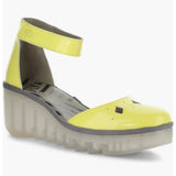 Yellow wedge with clear sole and velcro strap side view