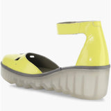 Yellow wedge with clear sole and velcro strap side alternate view