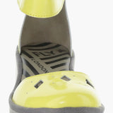 Yellow wedge with clear sole and velcro strap front view