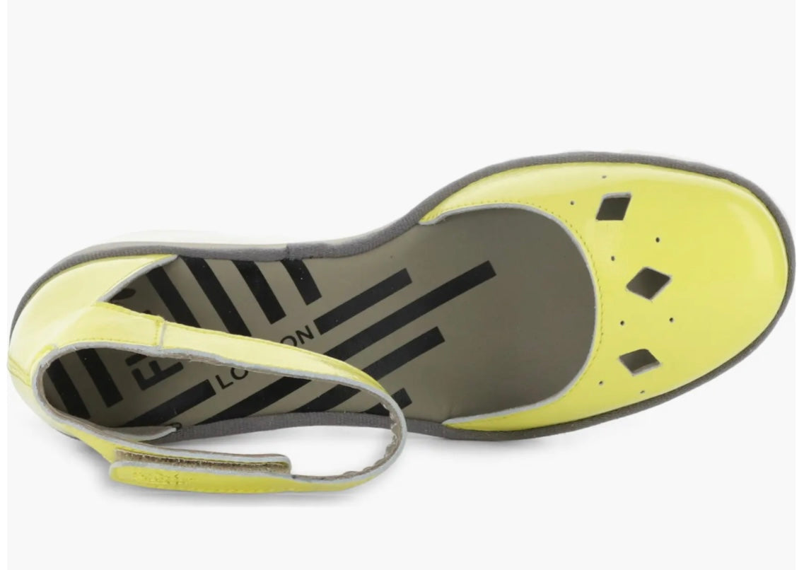 Yellow wedge with clear sole and velcro strap top view