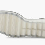 Yellow wedge with clear sole and velcro strap bottom view