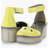 Yellow wedge with clear sole and velcro strap pair