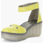 Yellow wedge with clear sole and velcro strap front alternate view
