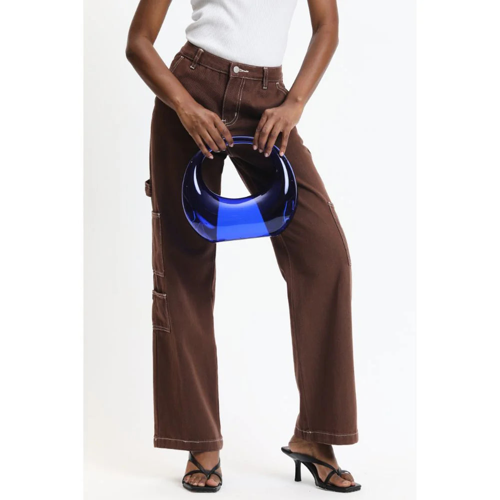 Transparent blue circular acrylic handbag with a gold chain strap model 2