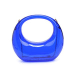 Transparent blue circular acrylic handbag with a gold chain strap back