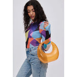 Transparent orange circular acrylic handbag with a gold chain strap model 2