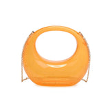 Transparent orange circular acrylic handbag with a gold chain strap alt view 2