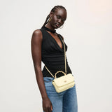 Cream leather quilted handbag with chain strap model 