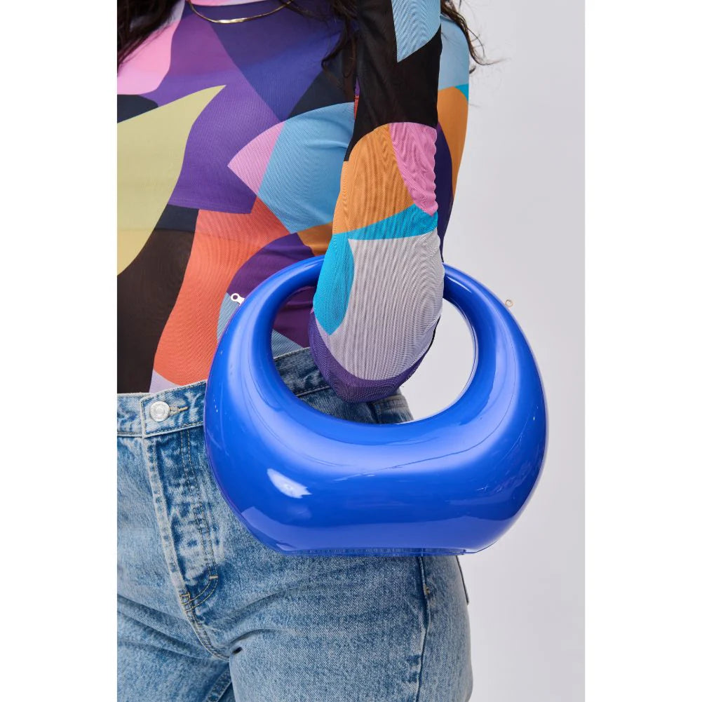 Blue circular acrylic handbag with a gold chain strap model 4