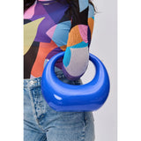 Blue circular acrylic handbag with a gold chain strap model 4